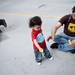Ann Arbor residents Kai, 2, and his father Loren Ryter play with bubbles during the 18th annual African American Downtown Festival. Daniel Brenner I AnnArbor.com